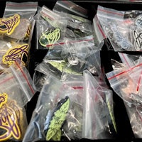 a bag of various stickers in a plastic bag