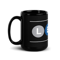 a black mug with the word leo on it